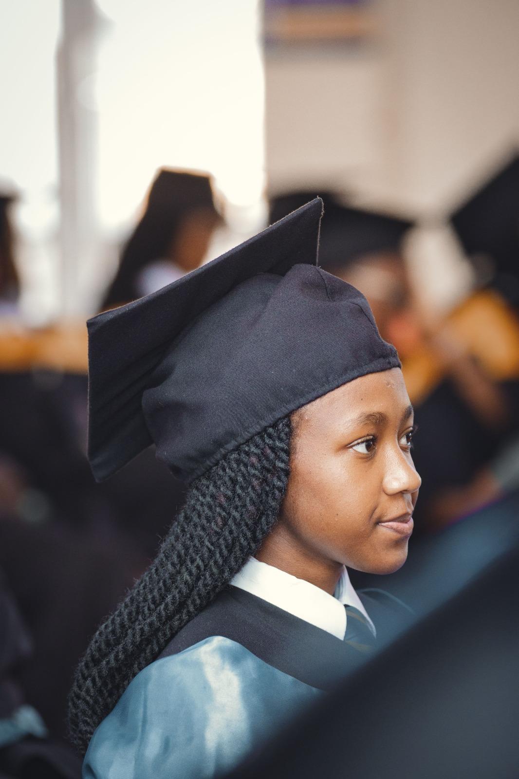 Determined graduate in cap and gown